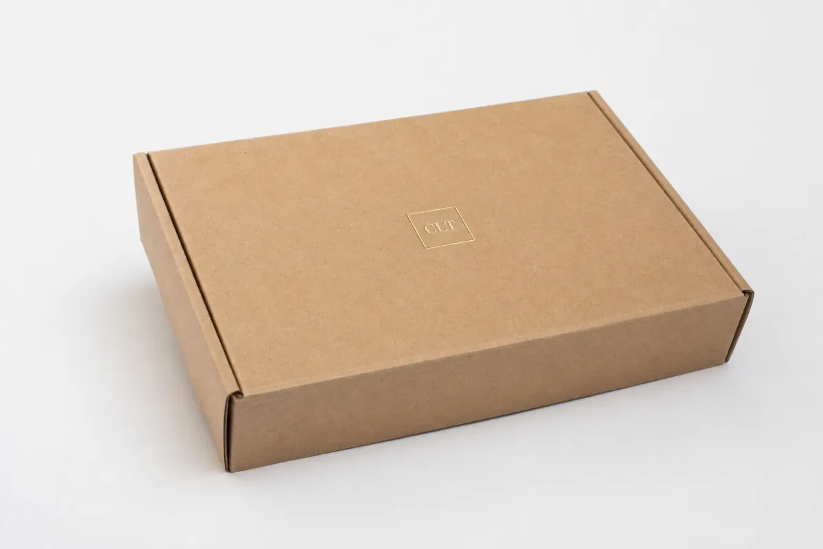 Custom Kraft Shipping Cartons: Board, Finish, Dieline, and