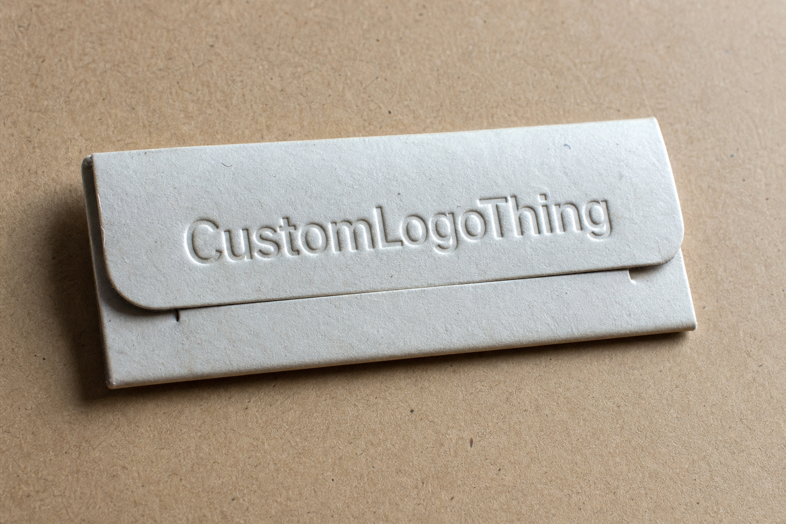 Custom Embossed Box Seals: Board, Finish, Dieline, and Unit Cost
