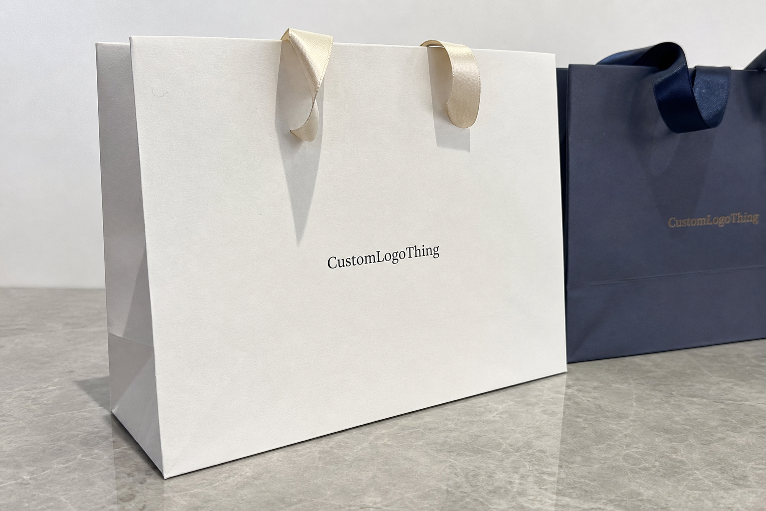 Buy Custom Ribbon Handle Paper Bags for Hotel Welcome Gifts