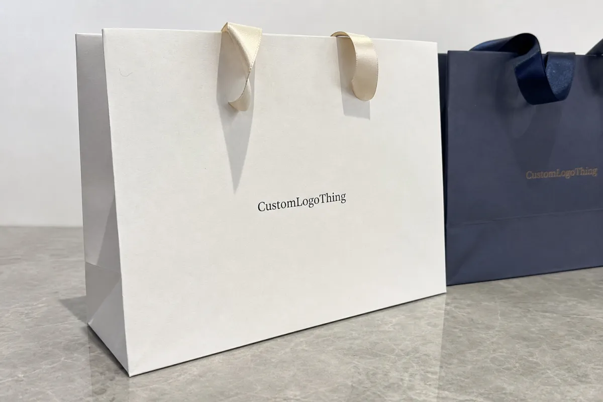 Buy Custom Ribbon Handle Paper Bags for Hotel Welcome Gifts