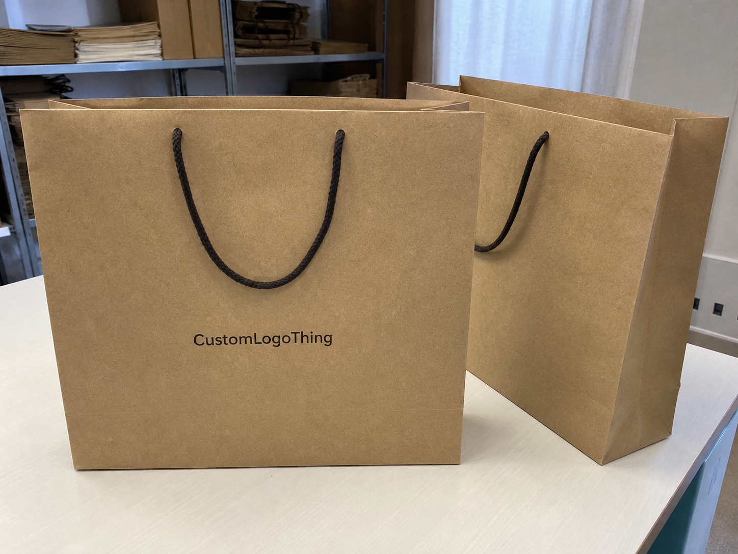 Hotel Flat Handle Paper Bags Logo Placement for Orders