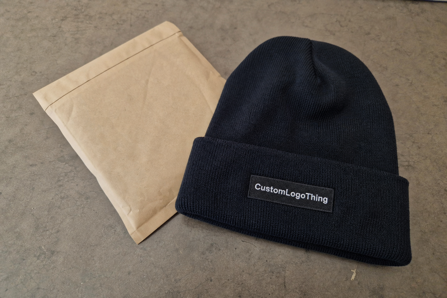 Fitness slouchy knit beanies for gym merch that actually gets worn - CustomLogoThing packaging example