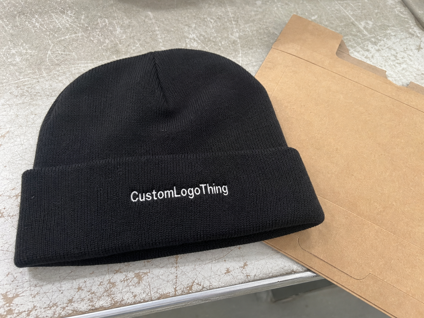 What a subscription embroidered beanies supplier actually handles - CustomLogoThing packaging example
