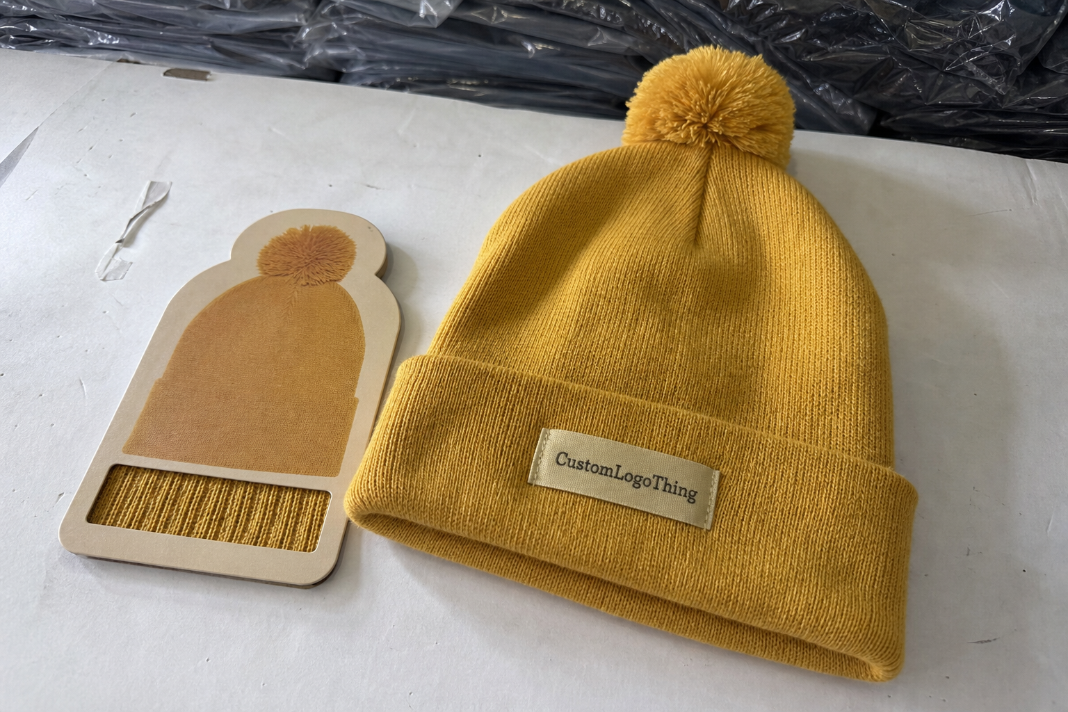 Vitamin Pom Pom Beanies Material Sample Guide for Buyers