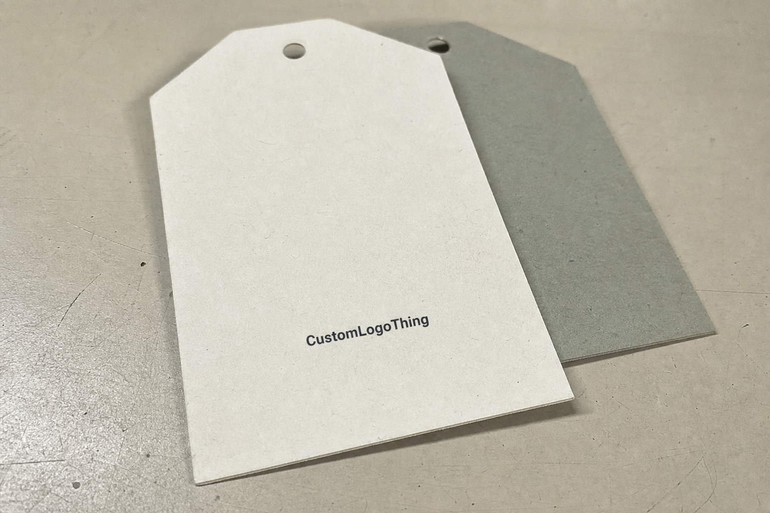 Custom Apparel Hang Tags: How to Spec, Price, and Order