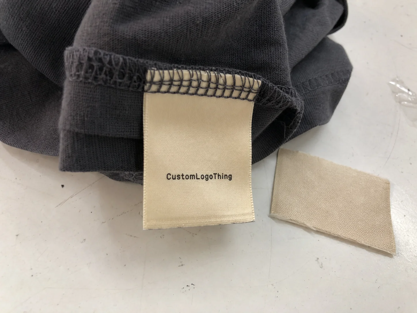 Custom Logo Clothing Tags China Factory: Buyer's Guide