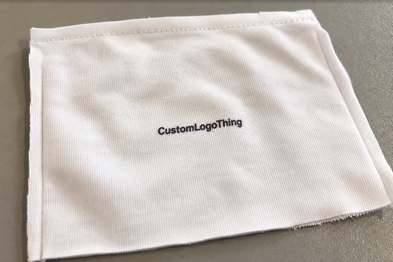 Why heat-applied branding can outperform sewn tags - CustomLogoThing packaging example