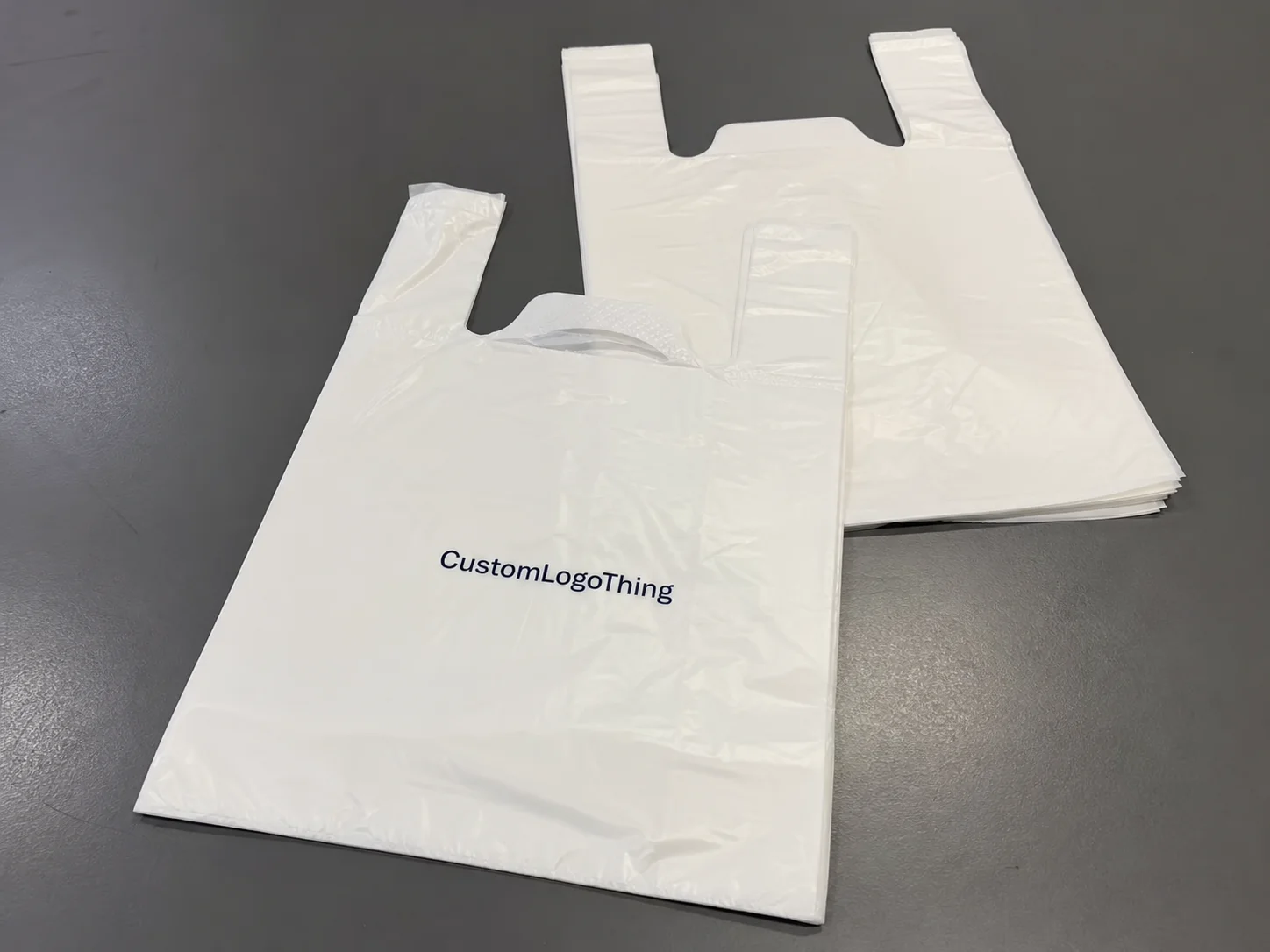 What custom plastic t shirt bags are and why stores still use them - CustomLogoThing packaging example