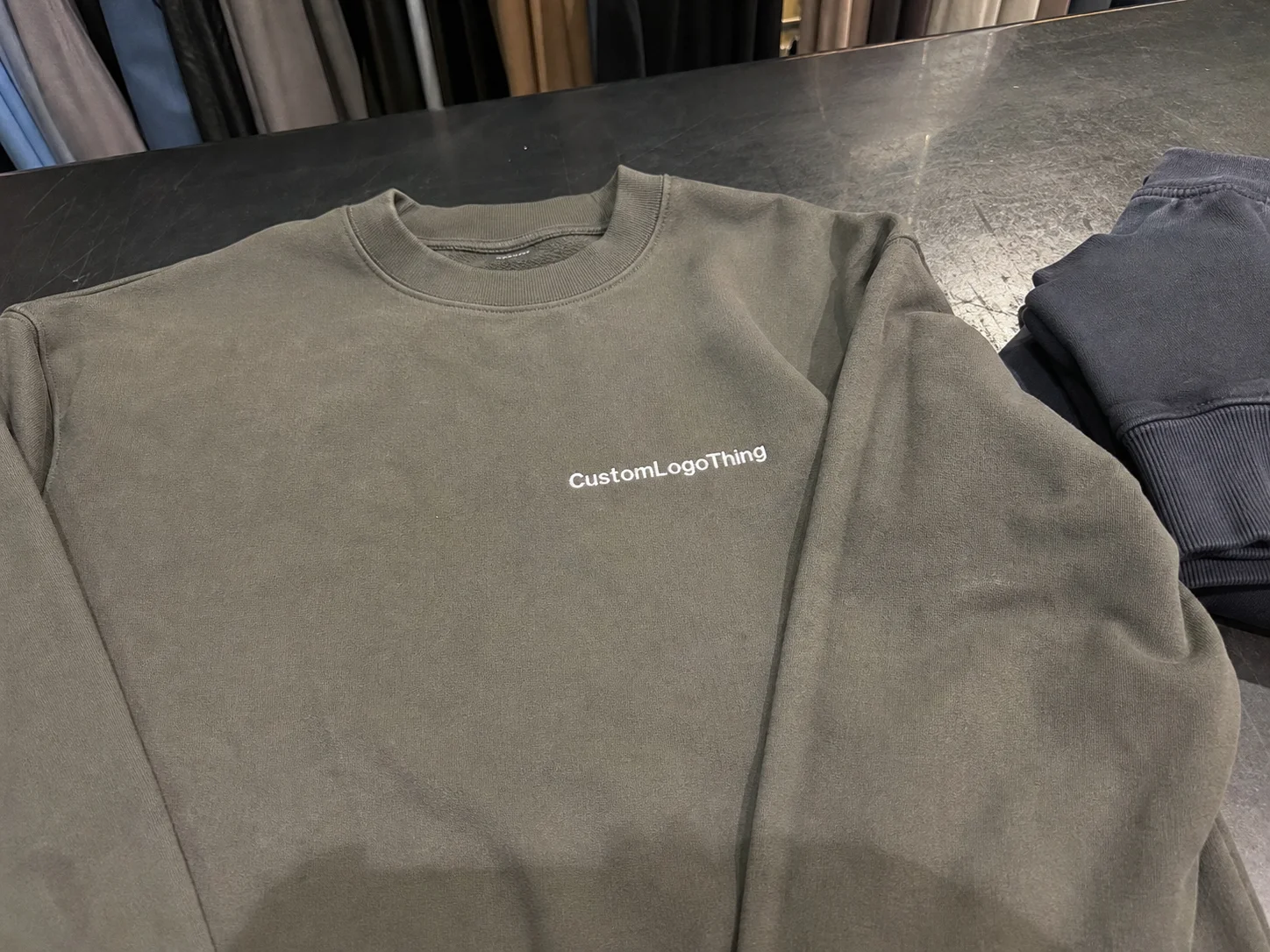 What Custom Slab Labels Actually Do for Apparel - CustomLogoThing packaging example