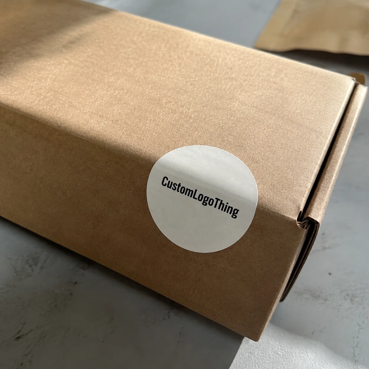 Custom Printed Logo Stickers Are Small, But They Carry the Brand - CustomLogoThing packaging example
